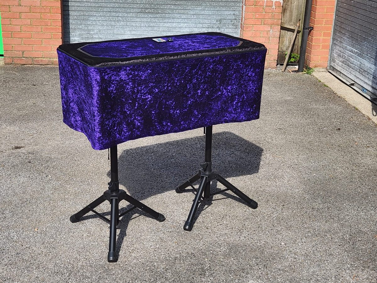 Full purple performing table on twin stands