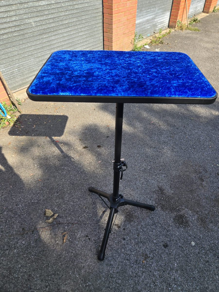 Blue crushed velvet table on single adjustable stand